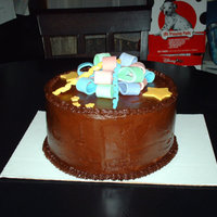 The Bow Triple chocolate cake layered with caramel mouse and frosted with fudge icing and topped with a fondant bow. (My first experience with...