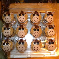 Coordinating Horse Cupcakes The horse cupcakes I made to go with the horse cake. Chocolate cake, peanut butter frosting.