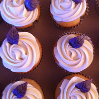 Purple Leaf vanilla cake with purple gum paste leaf. I tried adding black sprinkles to go with the color scheme of the party but it looked like dirt.