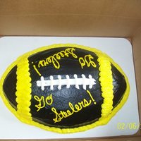 Superbowl 2011 Go Steelers This was a footbal shaped pan with the steelers colors! I made 3 of these cakes chocolate, chocolate and vanilla swirl and a red velvet....