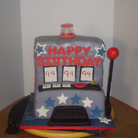 Slot Machine Cake This is my 4th cake. Its 7 1/2 sheet cakes different flavors for each layer. Cover in buttercream and fondant. It had led lights trying to...