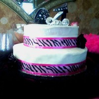 Zebra Cake Vanilla buttercream frosted cake. Gumpaste high heel. The last picture is the smash cake and has rosettes on it.. that one didn't turn...