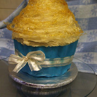 Giant Cupcake A vanilla pound cake with with caramel in between each layer, Butterscotch BC and a Toffee 'web'.