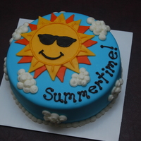 Summertime Cake Fun summer cake for some friends. Covered in MMF with buttercream piped clouds. Inspired by many others on CC.