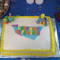 Cake For The Learning Experience Bday Party This was my first fondant character, and letters done by hand to get the correct logo. The rest of the cake is buttercream