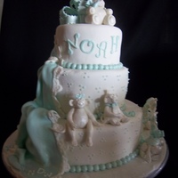 Fondant Animals Shower Cake This is a three tier baby shower cake. First tier was a vanilla bean cake filled with cream cheese and strawberry filling. Second was...