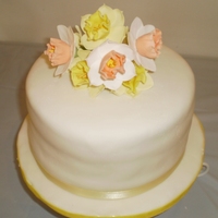 Daffodils white cake with white chocolate ganache and strawberry filling covered with MMF