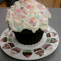 A Simple But Delicious Giant Cupcake This was just a simple practice run for my friend's daughter. She turns 1 next weekend and I am making her cake. My friend requested a...