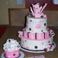 1St Birthday This was a very last minute cake order for a little girls 1st birthday. I don't love the way it turned out but I only had one days...