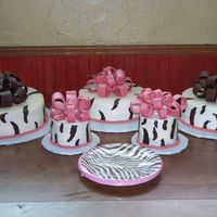 Zebra Bridal Shower Bridal shower cakes done to match plates ( also in picture) all different flavors and fillings, all buttercreme with gumpaste bows.