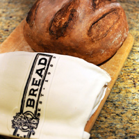 Acme Bread Co. Pain Au Levain This 3D Cake is designed after a loaf of artisan bread sold by Acme Bread Co. (Berkeley, CA). The loaf of bread and bag with the company...