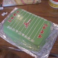 Alabama Football Cake I made this cake for a sweet 16. i actually made a helmet but dont have a pic with it on the cake handy.