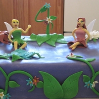 Tinkerbell And Rosetta Birthday Cake One of the first fondant covered cakes I ever made. My niece was turning 4 and wanted a Tinkerbell cake. kinda embarrassed the cake fell...