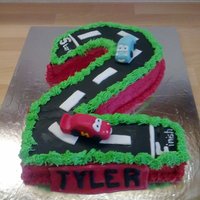 Number 2 With Cars Number 2 cake with a road on top and two cars from 'cars' the film