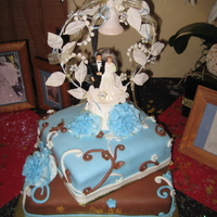 50Th Anniversary Original wedding cake top. All cake flowers fondant-original wedding color light blue original flower carnations. Coconut cream cake and...