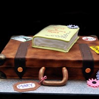 Vintage Luggage And Book Cake This was for a 70th birthday...The birthday girl loves to travel and read books...