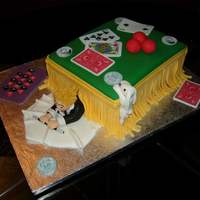 Magic Cake Close-up magic birthday cake for a magician. His face is featured on the cards and coins.