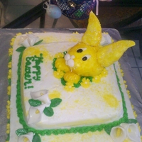 Yellow Bunny Cake..happy Easter! Bunny Cake made with fondant over RKT. Bottome tier is pineapple cake top tier is dark chocolate fudge cake. I would have liked to slim...