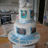 Babys Party Cake chocolate fudge cake on the bottom and raspberry jam sponge on top. printed pictures of the new arrival on wafer paper and stuck on with...