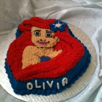 Ariel Birthday Cake All covered with buttercream. The cake would have been nice if I would of done the eyes just a little smaller. Oh well, we learn from our...