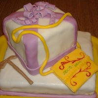 Graduation Cake For My Daughter Covered and decorated with fondant. Following the Hungarian tradition, I made a haversack and a "fokos" (that hammer-like object...