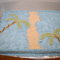 Beach Cake Cake to match an invitation. Was two sheet cakes (9x13 each) put together. All decorations were buttercream except for the sand. The sand...