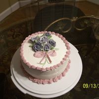 Birthday Cake This was my first birthday cake I made after my Wilton course. The cake was a strawberry cake with vanilla buttercream filling. All...