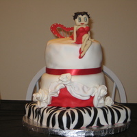 Betty Boop Valentine's Day Cake This is the first time I have ever worked with fondant,. gum paste, or a layered cake. I loved the idea of Betty Boop as a torch singer as...