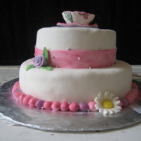 Mother's Day Lemon Pound Cake with Lemon Vanilla Buttercream Icing. Almond FondantGumpaste tea pot, fondant flowers