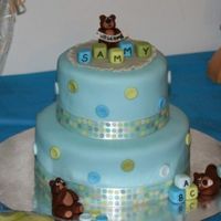 Shower Cake This was my first attempt at making fondant figures - it was easier than I thought but I still have a lot to learn. Thanks for looking.