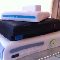 Gaming Party XBOX 360, Playstation 2 & Wii - all made out of chocolate cake with chocolate BC - fondant accents.