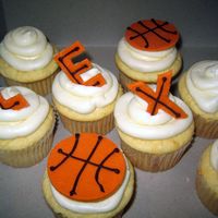 Basketball Cupcakes Doctored box cake mix with canned (gross) frosting. Basketballs & letters are fondant with chocolate writing - they're supposed to...