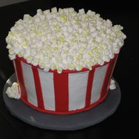 Popcorn Fun cake to make! BC with fondant accents and mini marshmallows for popcorn. Vanilla cake with chocolate chip cookie dough filling - it got...