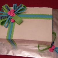 Birthday Cake White cake, less-sweet bc icing & cookie dough filling (turning out to be a family favorite). Bow/ribbon was made out of fondant......