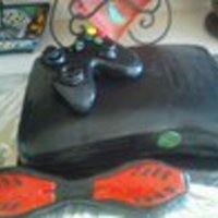 Xbox Cake I made this Xbox cake was made for my son's birthday. The controller and ripstick are rice crispy treats covered in fondant.