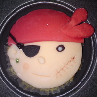 Pirate Cupcake Vanilla sponge cupcake covered in sugarpaste icing, pirate themed.