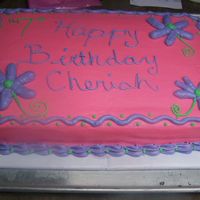 Happy Birthday Cherish white cake with buttercream frosting.