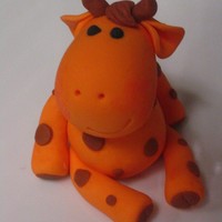 Giraffe This was the topper for a very simple, elegant, Noah's Ark baby shower cake. The figures in the additional photos went on top on...