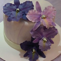 Orchids And Marble I marbled the fondant and made the orchids from gumpaste. This was the first time that I made orchids. :)
