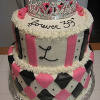 Forever 39 This was my first attempt at a two-tiered cake, and I'm still new to fondant, but it was easier than I expected. I did find a similar...