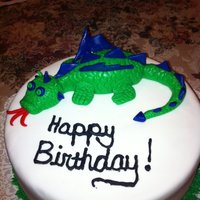 Dragon Cake Chocolate cake, drapped in MM fondant. Dragon is made out of MM fondant too.