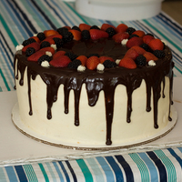 Wasc With Poured Ganache & Berries First time managing to get smooth buttercream! Cake was 13 inch 3 layer WASC cake with strawberry buttercream in between layers, and...