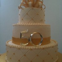 50Th Wedding Anniversary Buttercream with fondant accents. Hand painted pearls on quilted pattern