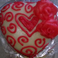 Heart Cake small heart cake, covered in chocolate clay, choc clay roses, and royal icing. This is only my 2nd cake, so I still have much to learn, but...