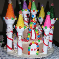Christmas Castle Baked chocolate cakes with Wilton Romance Castle pieces accented in rolled fondant and gum paste & candy accents. This was the...
