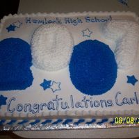 Carla's Graduation Cake This is 2-12x18's covered in buttercream.