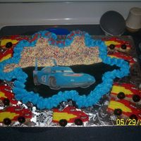Cars Cupcake Cake And Cookies I had a friend whose son wanted a cake, cupcakes, cookies, and ice cream for his birthday. We decided on a cupcake cake (covered 2...