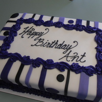 Purple Daze Fondant birthday cake. Stripes and dots in shades of purple :)