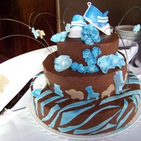 Chocolate Safari Baby Shower This is my first attempt at a "social occasion" cake. All the details are fondant and gumpaste. I had FUN with this too!