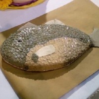 Groom's Cake Fish Groom's cake done for a bow fisherman. covered in fondant and gumpaste for the fins. made in july 09